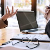 businessman candidate explaining about his profile and conducting a job to managers sitting in job